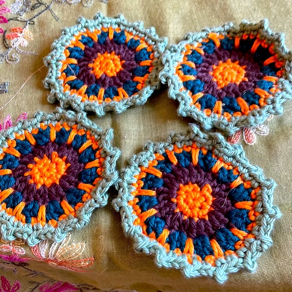 Hand crocheted Mandala coasters in sage green, orange, dark teal and brown. - Picture 1 of 6